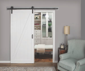 A picture of a L057 pre-finshed white sliding barn door.