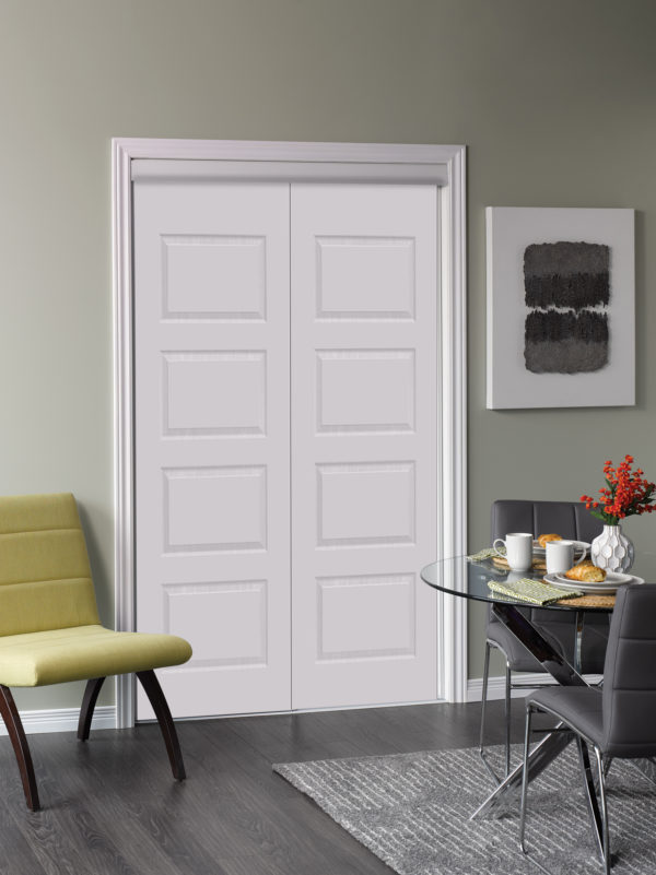 Beautiful solid white modern door with a chair beside it and a small table with tea cups and red flowers