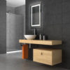 tiled bathroom with wood furniture