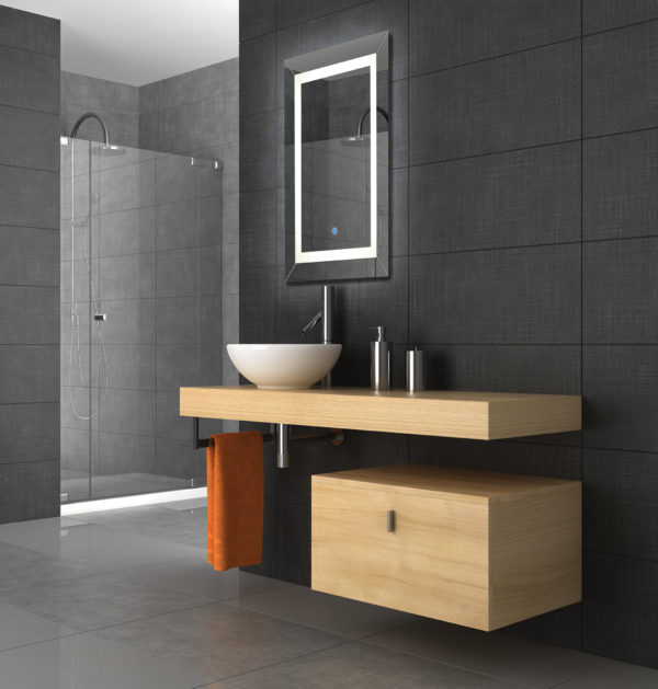 tiled bathroom with wood furniture