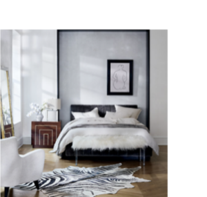 Modern bedroom with grey and black features and a white bed.