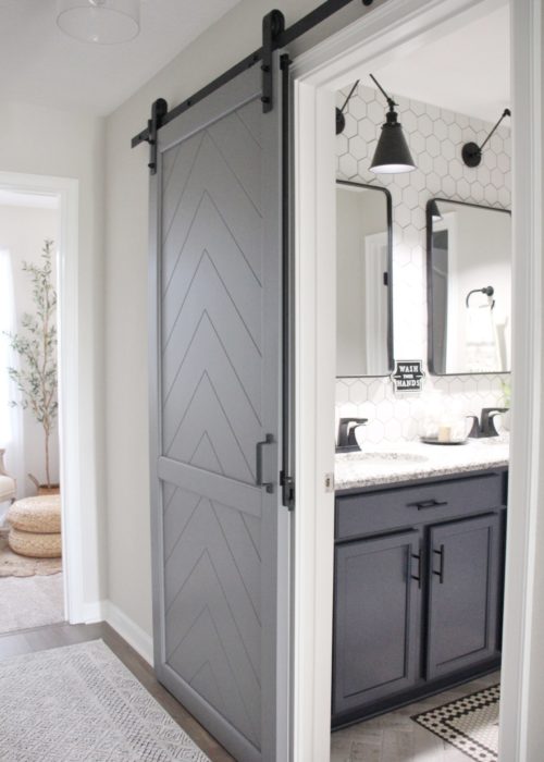 Kelsey Mansingh Installed our Gatsby Mix & Match Hardware Barn Door Kit for Guest Bathroom