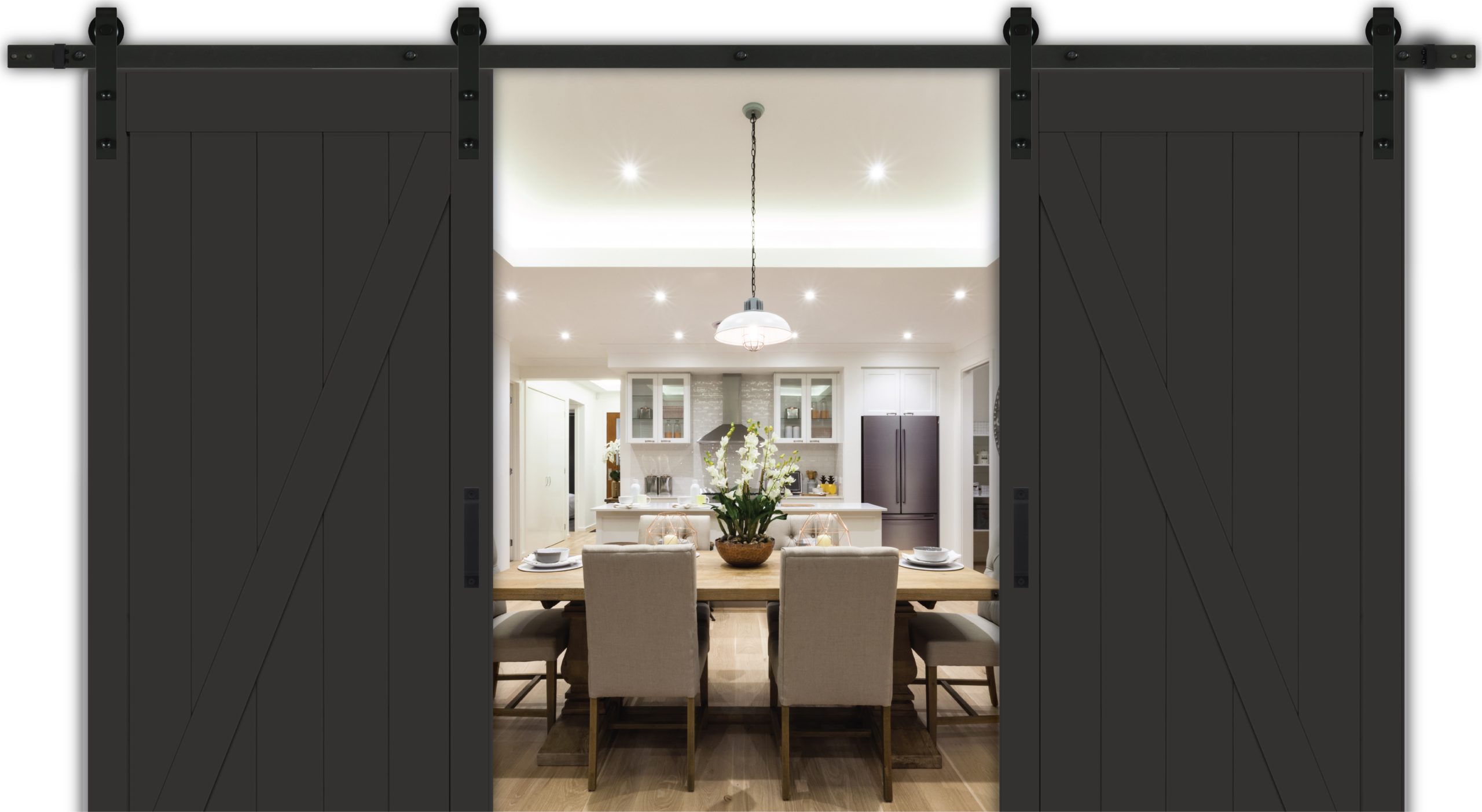 A double sliding barn door painted with Black Beauty Benjamin Moore 2128-10, in a dining room with a timeless interior.